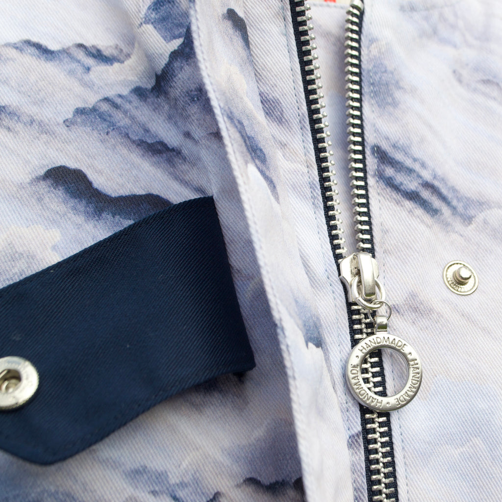 cute dreamy blues on 100% cotton cloud print, oversized gilet vest for women with hidden zip and popper closure. handmade, sustainable vest for women