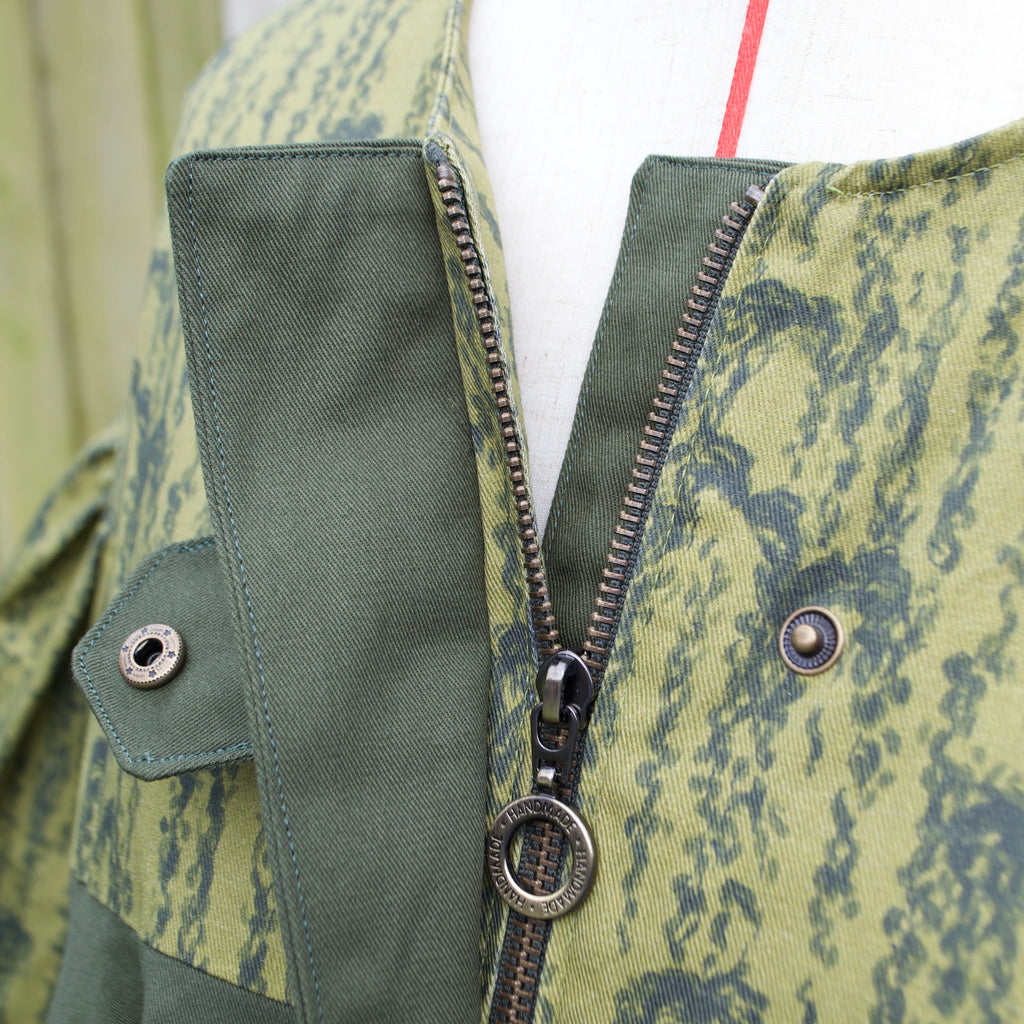 exclusive handmade chic willow leaves print on 100% cotton fabric, olive and dark green print with contrast ruffle, hidden zip closure and snap fastening
